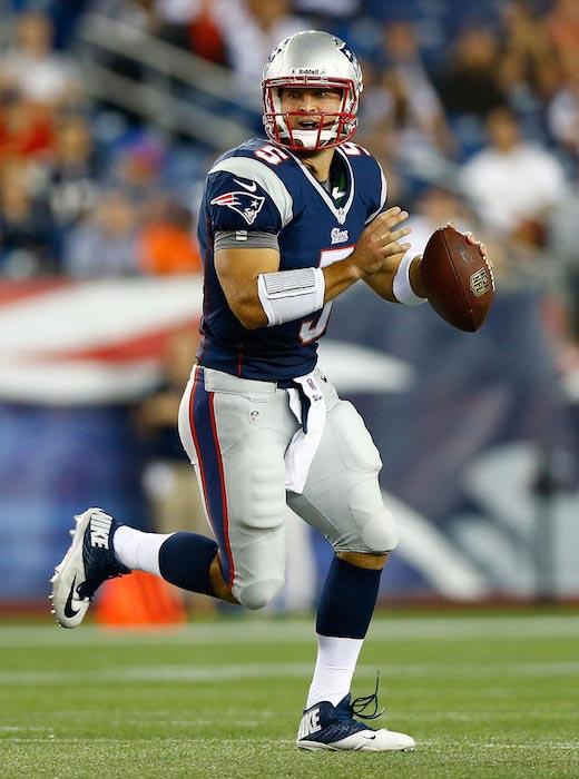 Tim Tebow igra za New England Patriots na tekmi proti Tampa Bay Buccaneers 16. avgusta 2013