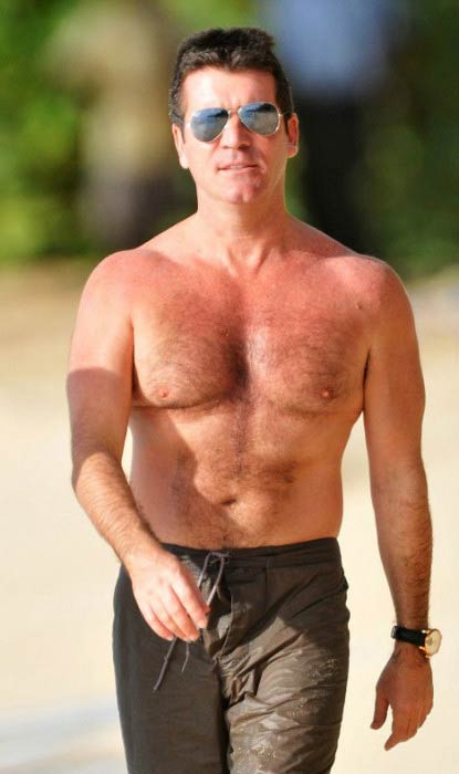 Simon Cowellin paidaton vartalo Barbadoksen rannalla joulukuussa 2008